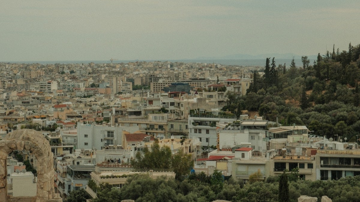 a view of a city from a hill